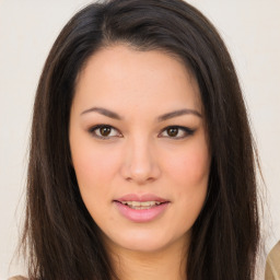 Joyful asian young-adult female with long  brown hair and brown eyes