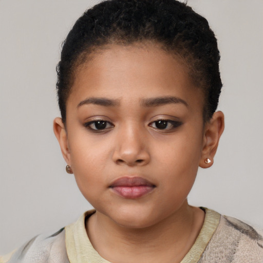 Neutral latino child female with short  brown hair and brown eyes