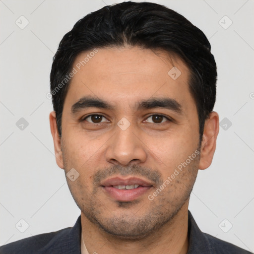 Joyful latino young-adult male with short  black hair and brown eyes