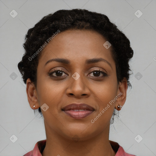 Joyful black young-adult female with short  brown hair and brown eyes