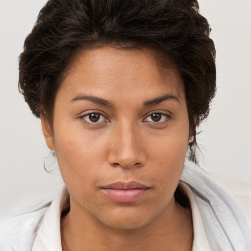 Neutral white young-adult female with short  brown hair and brown eyes