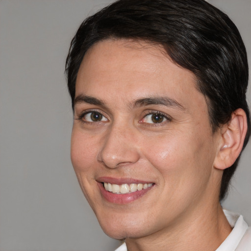 Joyful white young-adult female with medium  brown hair and brown eyes