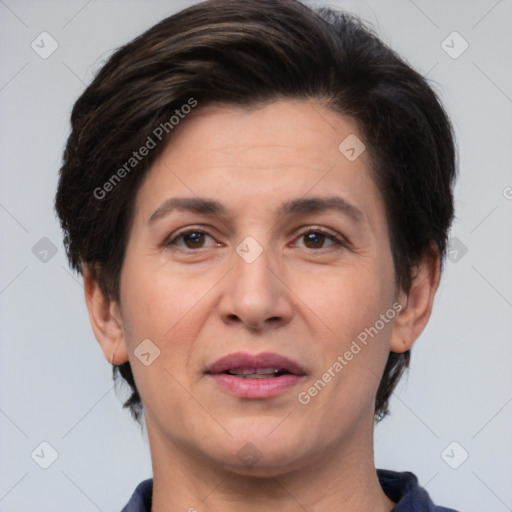 Joyful white adult female with short  brown hair and brown eyes