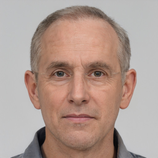 Neutral white middle-aged male with short  gray hair and grey eyes