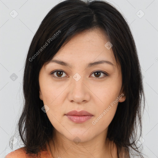 Joyful asian young-adult female with long  brown hair and brown eyes