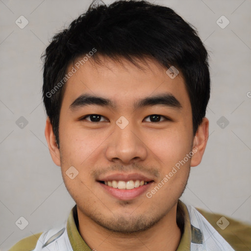 Joyful asian young-adult male with short  black hair and brown eyes