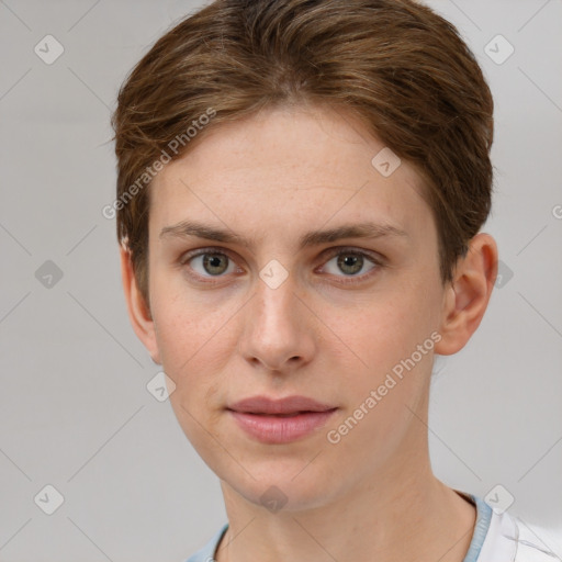 Joyful white young-adult female with short  brown hair and grey eyes