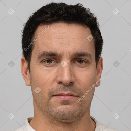 Neutral white adult male with short  brown hair and brown eyes