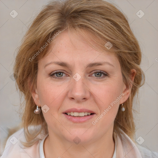 Joyful white young-adult female with medium  brown hair and blue eyes