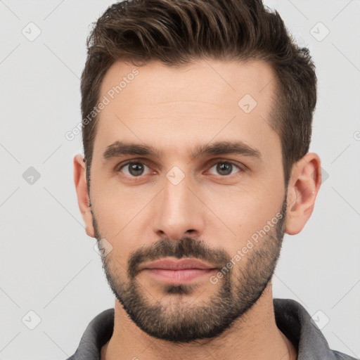 Neutral white young-adult male with short  brown hair and brown eyes