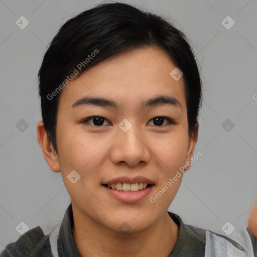 Joyful asian young-adult female with short  black hair and brown eyes