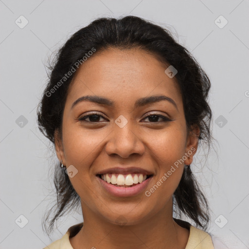 Joyful latino young-adult female with medium  black hair and brown eyes