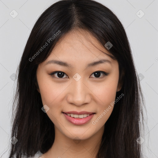 Joyful asian young-adult female with long  brown hair and brown eyes