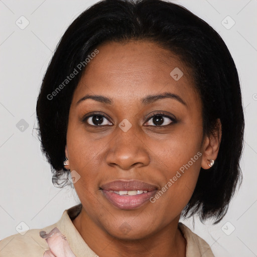 Joyful latino adult female with medium  brown hair and brown eyes