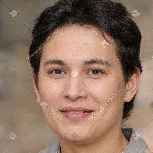 Joyful white adult female with medium  brown hair and brown eyes