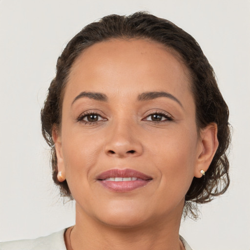 Joyful white young-adult female with medium  brown hair and brown eyes