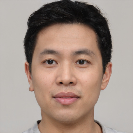 Neutral asian young-adult male with short  black hair and brown eyes