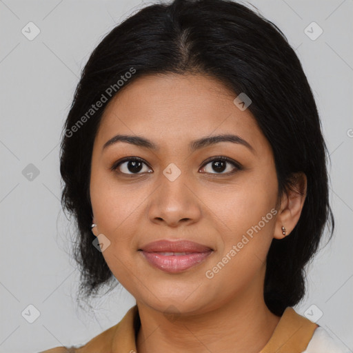 Joyful asian young-adult female with medium  black hair and brown eyes