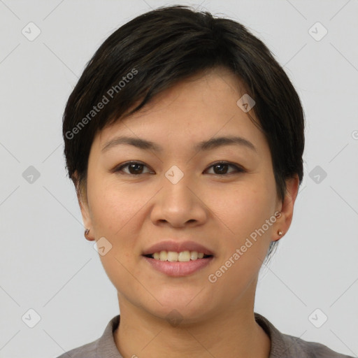 Joyful asian young-adult female with short  brown hair and brown eyes