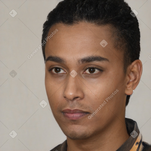 Neutral latino young-adult male with short  black hair and brown eyes