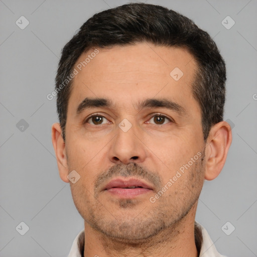 Neutral white adult male with short  black hair and brown eyes