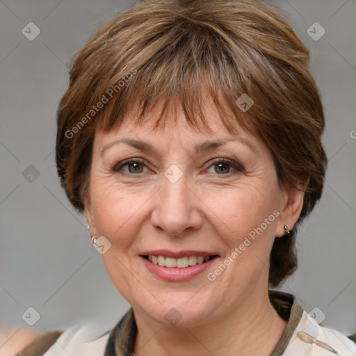 Joyful white adult female with medium  brown hair and grey eyes