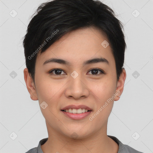 Joyful asian young-adult female with short  black hair and brown eyes