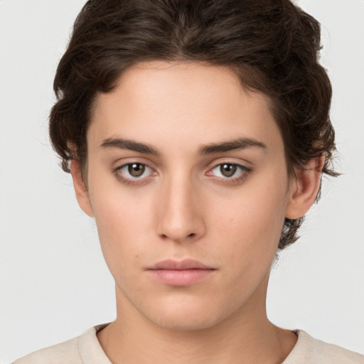 Neutral white young-adult female with short  brown hair and brown eyes