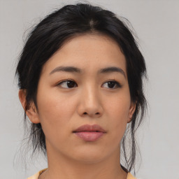 Neutral asian young-adult female with medium  black hair and brown eyes