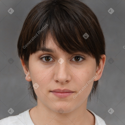 Neutral white young-adult female with medium  brown hair and brown eyes