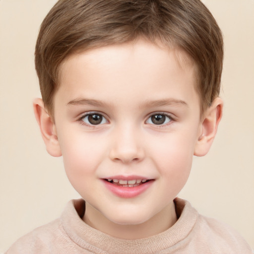 Joyful white child male with short  brown hair and brown eyes