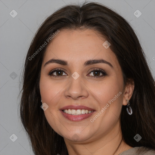 Joyful white young-adult female with long  brown hair and brown eyes