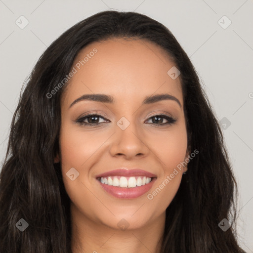 Joyful latino young-adult female with long  brown hair and brown eyes