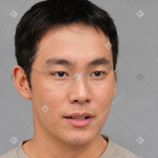 Neutral asian young-adult male with short  brown hair and brown eyes