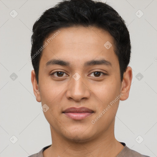 Joyful latino young-adult male with short  black hair and brown eyes