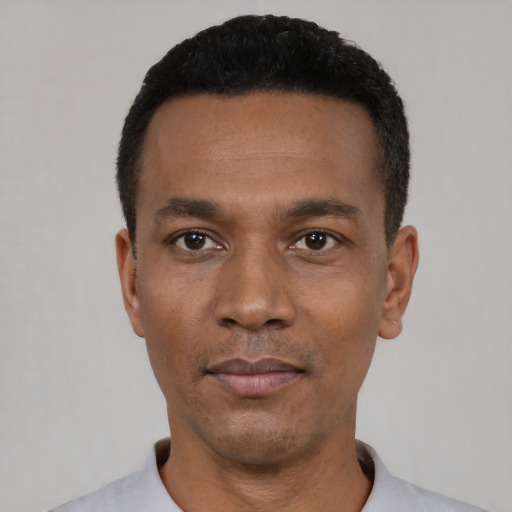 Neutral black young-adult male with short  black hair and brown eyes