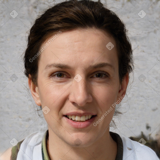 Joyful white adult female with short  brown hair and brown eyes