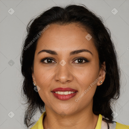 Joyful latino young-adult female with medium  brown hair and brown eyes