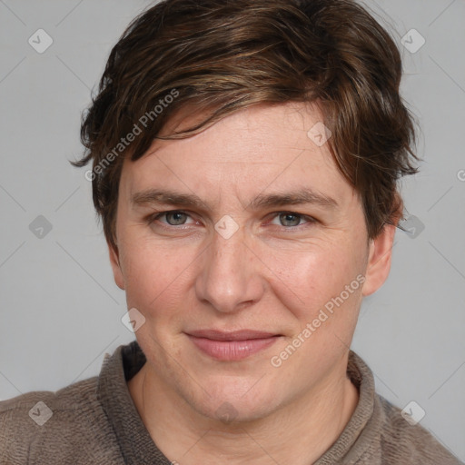 Joyful white adult female with medium  brown hair and blue eyes