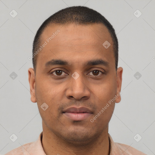 Neutral latino young-adult male with short  black hair and brown eyes