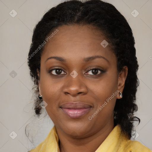 Joyful black young-adult female with medium  brown hair and brown eyes