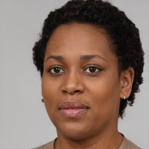 Neutral black young-adult female with short  brown hair and brown eyes
