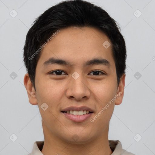 Joyful asian young-adult male with short  brown hair and brown eyes