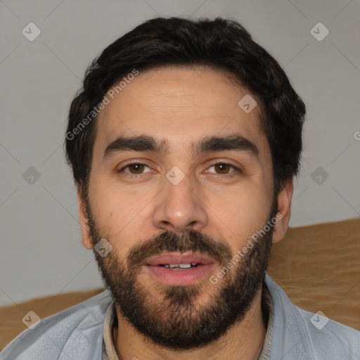 Joyful white young-adult male with short  black hair and brown eyes