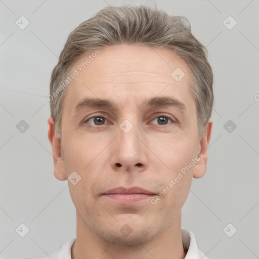 Neutral white adult male with short  brown hair and grey eyes