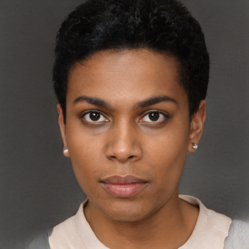 Neutral black young-adult female with short  black hair and brown eyes
