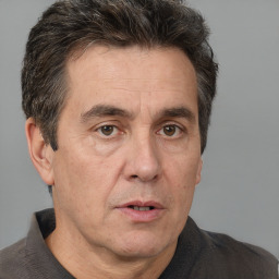 Neutral white adult male with short  brown hair and brown eyes