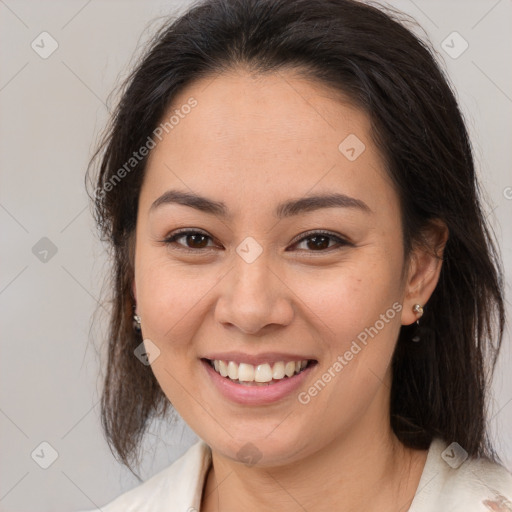 Joyful white young-adult female with medium  brown hair and brown eyes