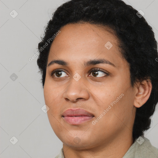 Joyful latino young-adult female with short  black hair and brown eyes