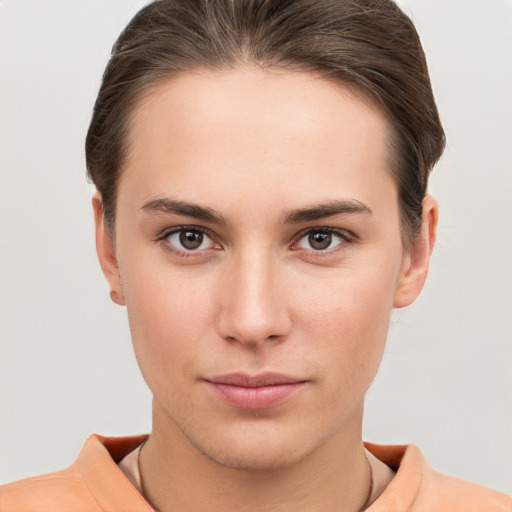 Neutral white young-adult female with short  brown hair and grey eyes